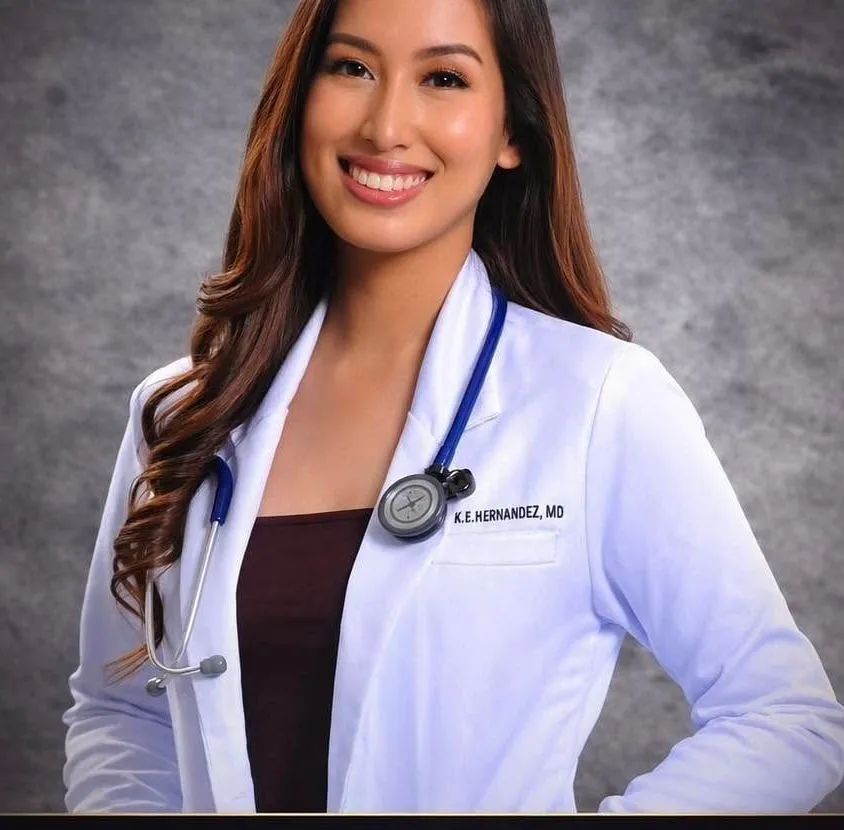 Dr. Katherine E. Hernandez, ShapeLab’s physician, in her white coat