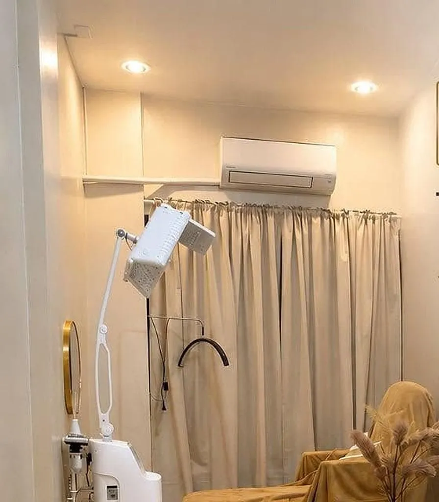 Treatment room with the reclining chair and lamp